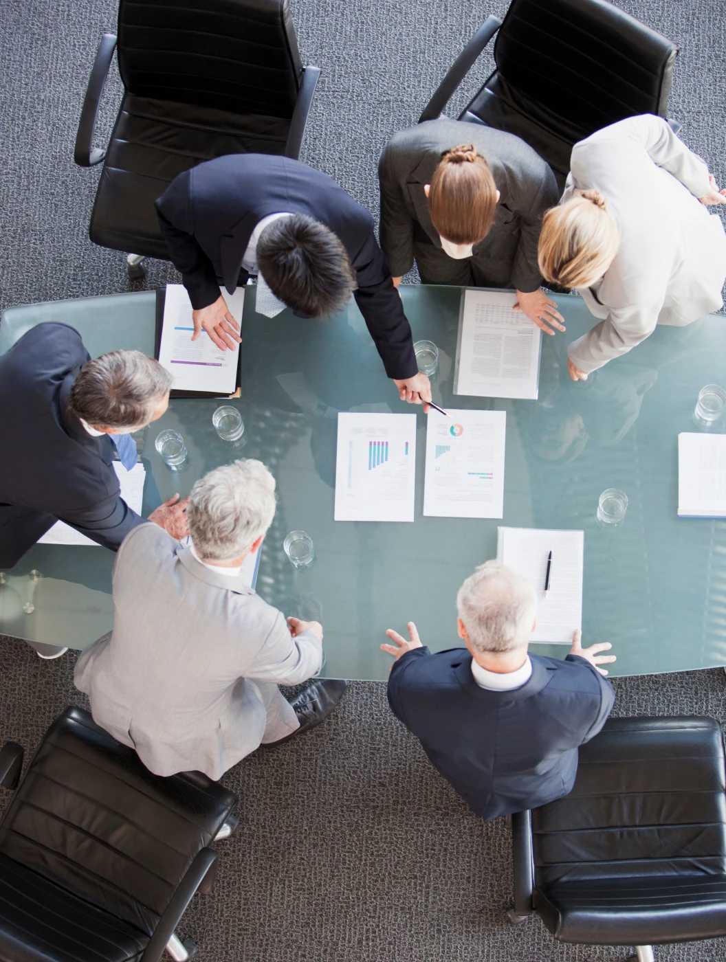 Colleagues collaborating around a conference table